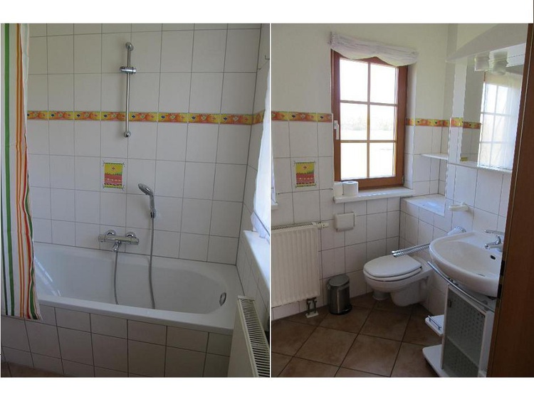 Die Badewanne mit Blick aus dem Fenster läd zum Entspannen ein