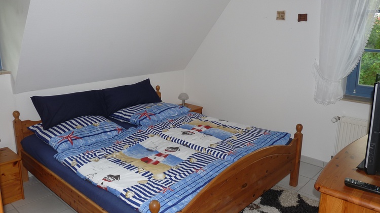 Schlafzimmer im OG Schlafzimmer im OG