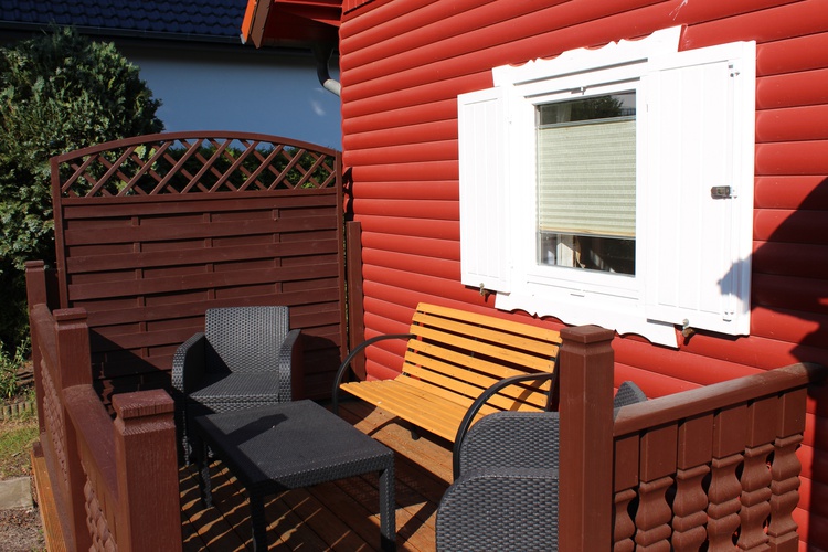 Terasse, Sitzauflagen, Schirm im Gerätehaus Terasse, Sitzauflagen, Schirm im Gerätehaus